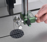 Close-up of a person adjusting a knob on the Cobra Scroll guide system for Record Power Sabre Bandsaw